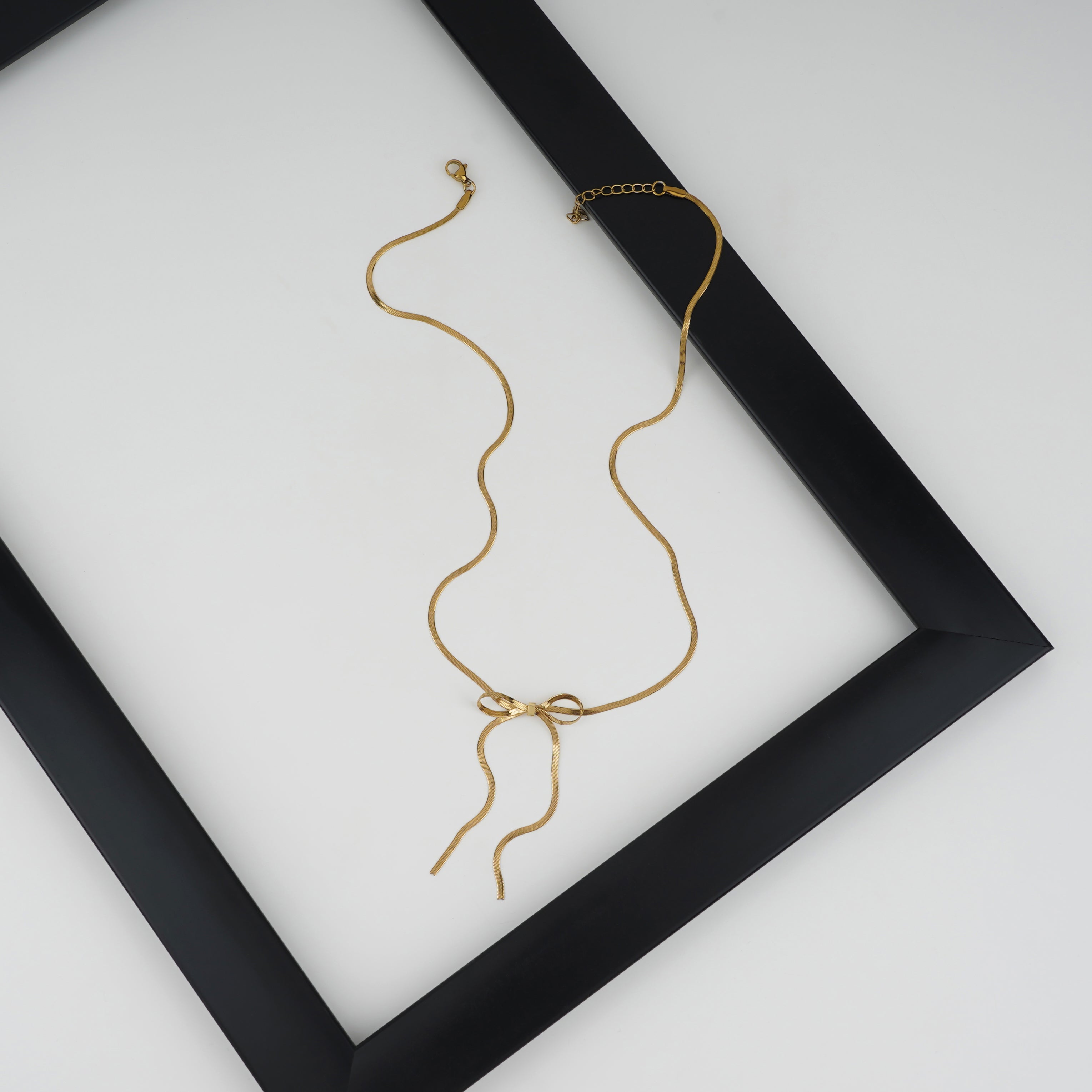 Elegant Bow Gold Pendant Necklace