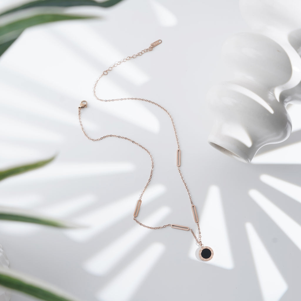 Minimalist Black Disc Pendant Necklace with Rose Gold Accents