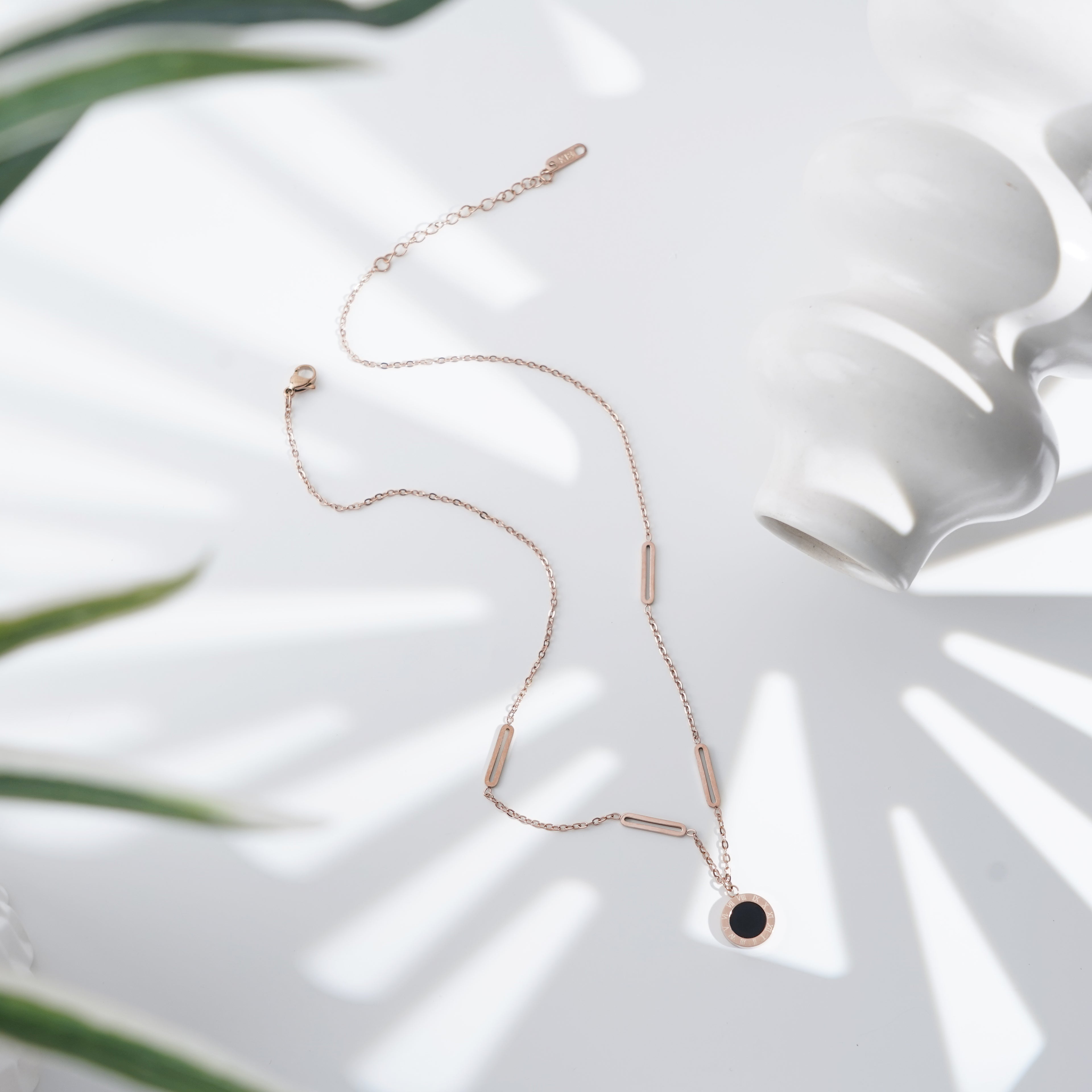 Minimalist Black Disc Pendant Necklace with Rose Gold Accents