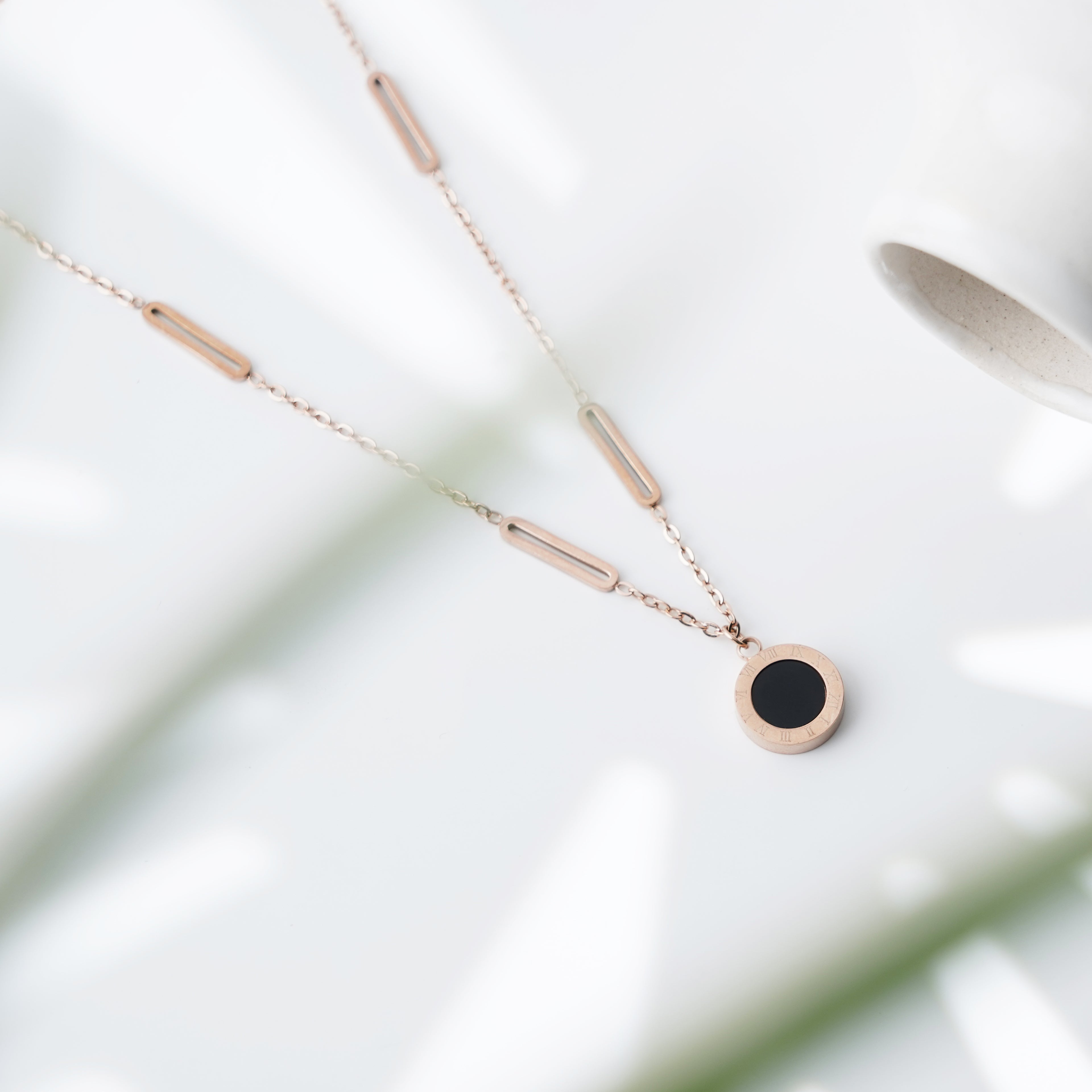 Minimalist Black Disc Pendant Necklace with Rose Gold Accents
